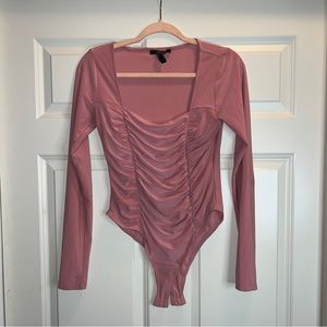 Pink bodysuit